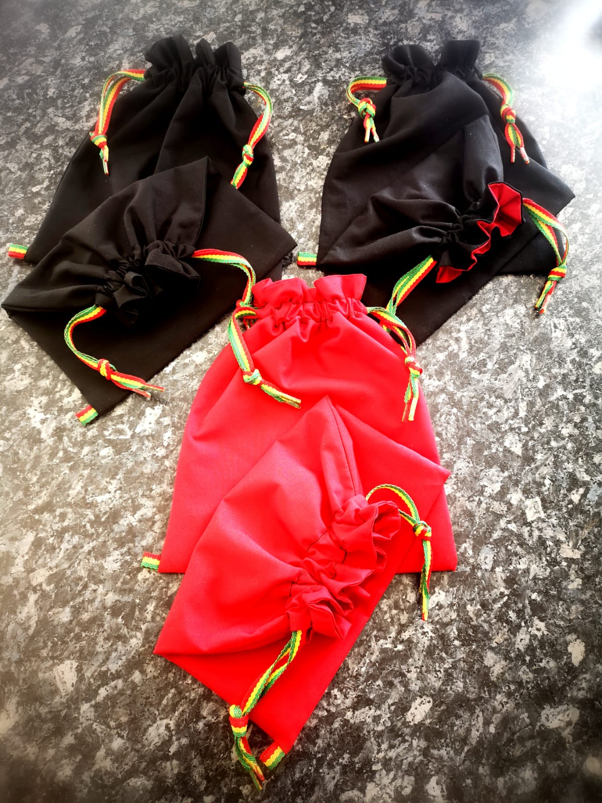 Exclusive unisex, multipurpose draw string bags, hand crafted by "RASTAPPAREL"